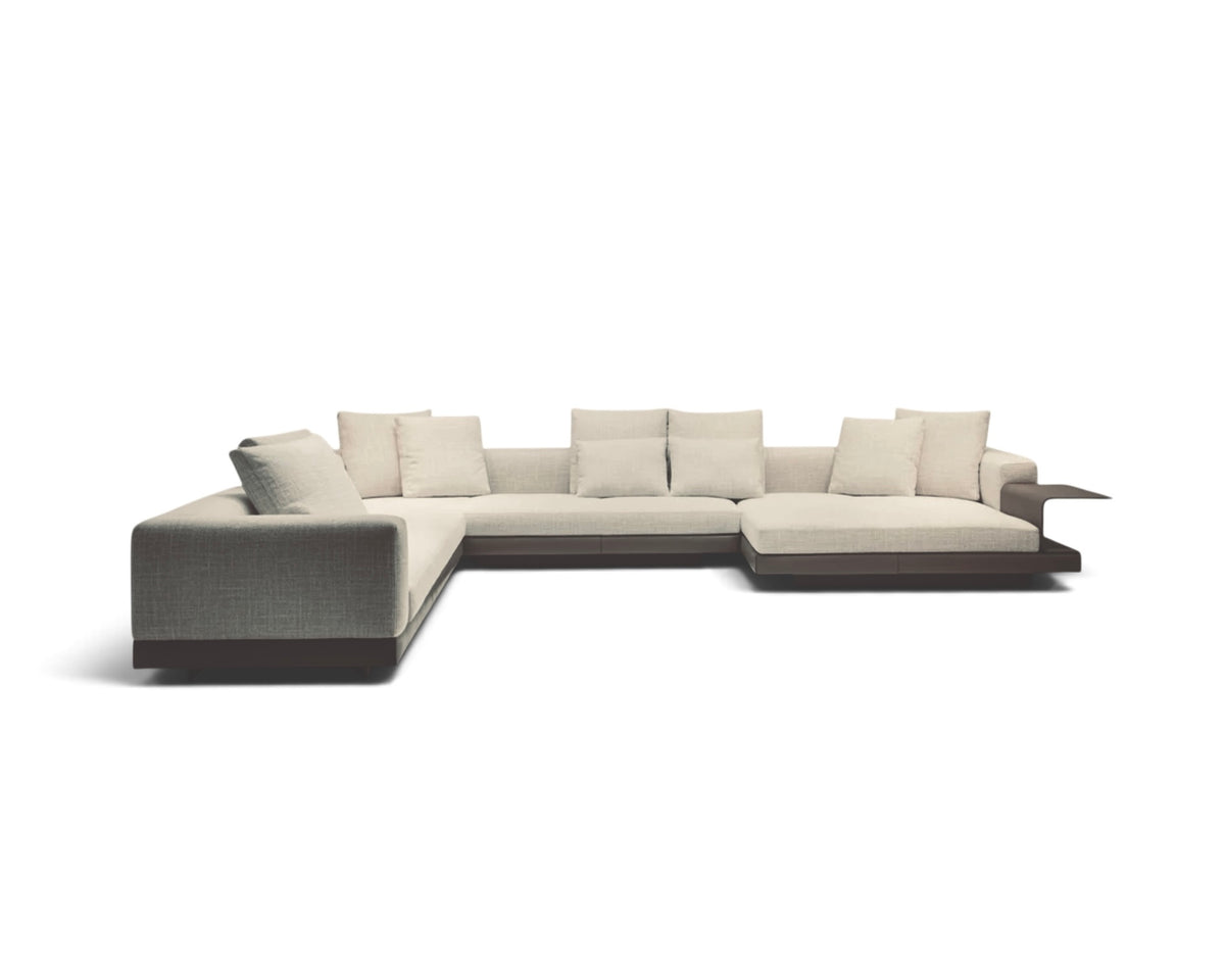 Modern L-Shaped corner sofa in a textured linen upholstery with a slime leather base | Nue Modern