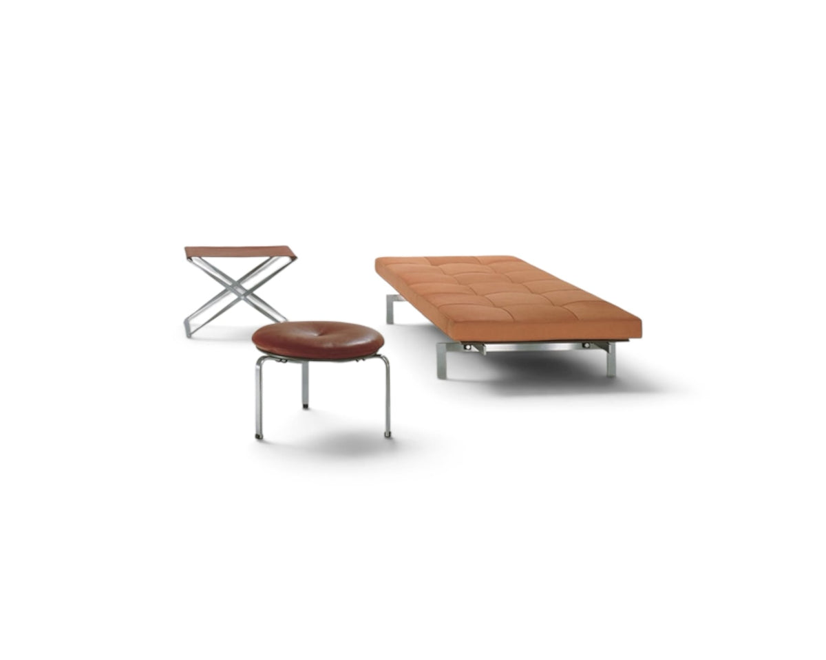 PK80 Daybed in tan leather, the PK91 folding stool and the PK33 stool | Nue Modern