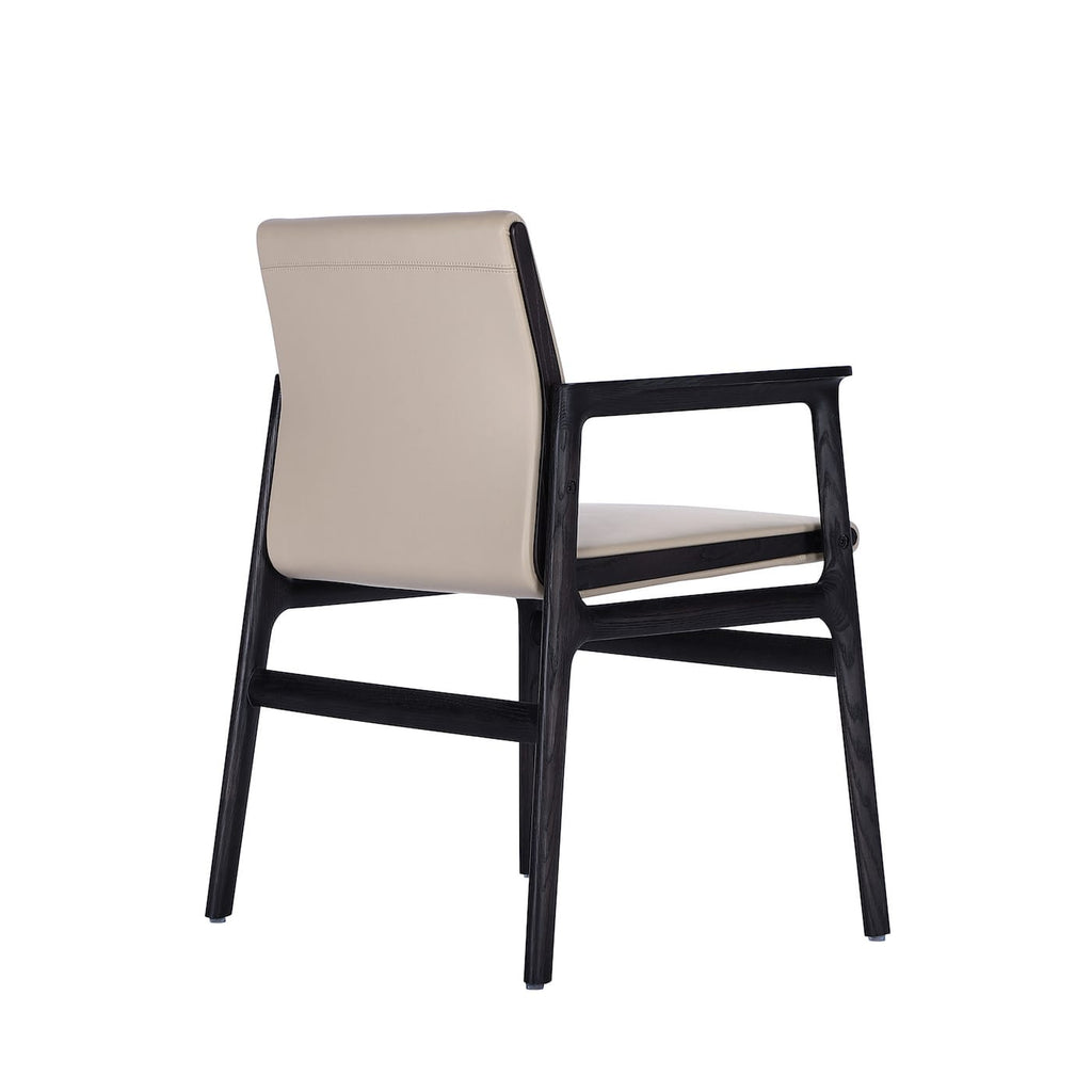 Copacabana Armchair - sweeping silhouette with relaxed glamour