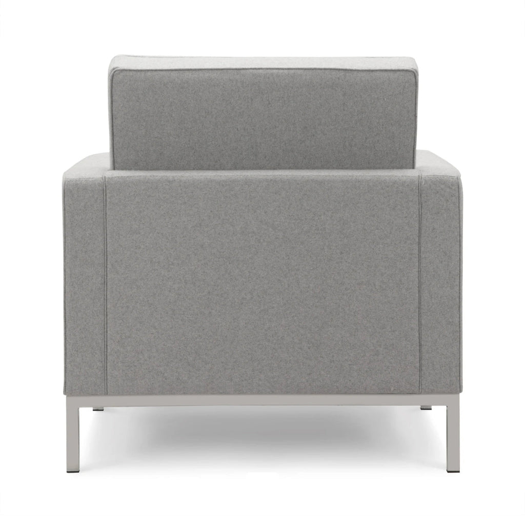 Florence Armchair - rectilinear geometry and precise upholstery
