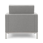 Florence Armchair - rectilinear geometry and precise upholstery