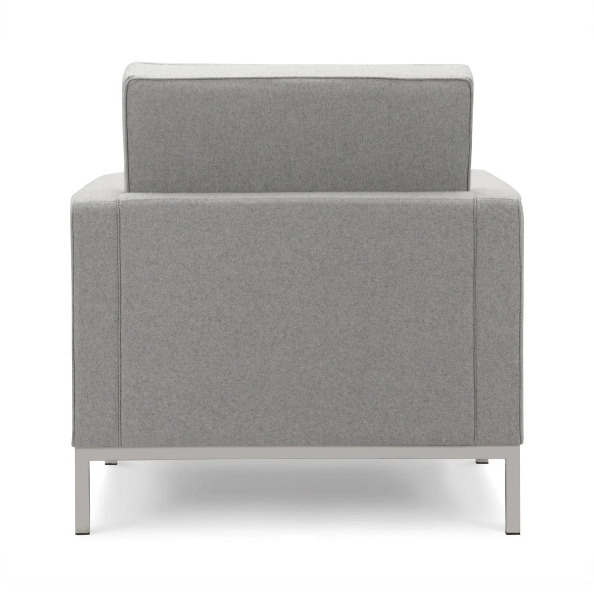 Florence Armchair - rectilinear geometry and precise upholstery