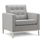 Florence Armchair - crisp tailored cushions on slim polished legs
