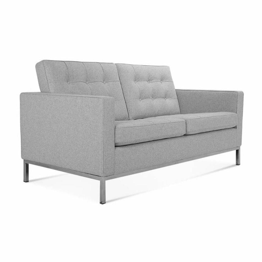 Florence 2-Seater Sofa - crisp tailored cushions on slim polished legs