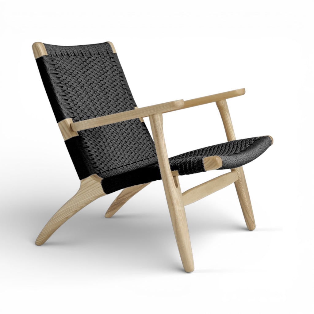 CH25 Lounge Chair - resilient, gently flexible woven seat