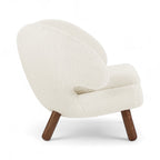 Pelican Chair - winged back wrapping the shoulders