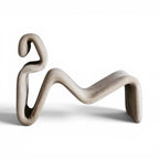 Etcetera Lounge Chair in ivory - side view of the flowing curve