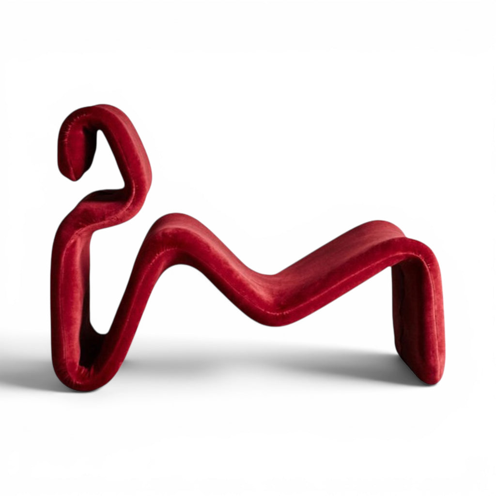 Etcetera Lounge Chair in red - side view of the wave-shaped profile