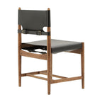 Spanish Dining Chair in Black Vegan Saddle Leather with walnut frame - three-quarter back view | Nue Modern