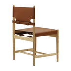 Spanish Dining Chair in Cognac Saddle Leather with Natural Ash Wood frame - Three-Quarter back view | Nue Modern