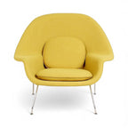 Womb chair upholstered in yellow fabric | Nue Modern