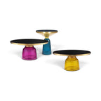 Group of Bell side and coffee tables with coloured glass bases