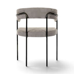 View of the back of the C-Chair shown in Light Grey fabric and black metal frame | Nue Modern