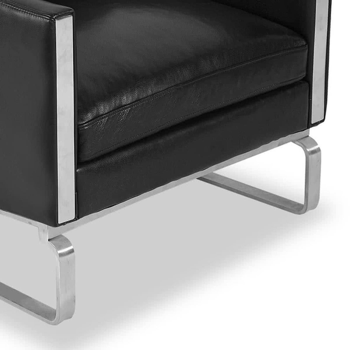 Close up view of the CH101 Armchair in black leather with metal base