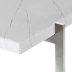 Close-up of the PK61 Coffee Table showing the white marble and stainless steel base | Nue Modern