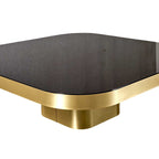 Bow Coffee Table in brass - rounded metal base in a warm brass finish