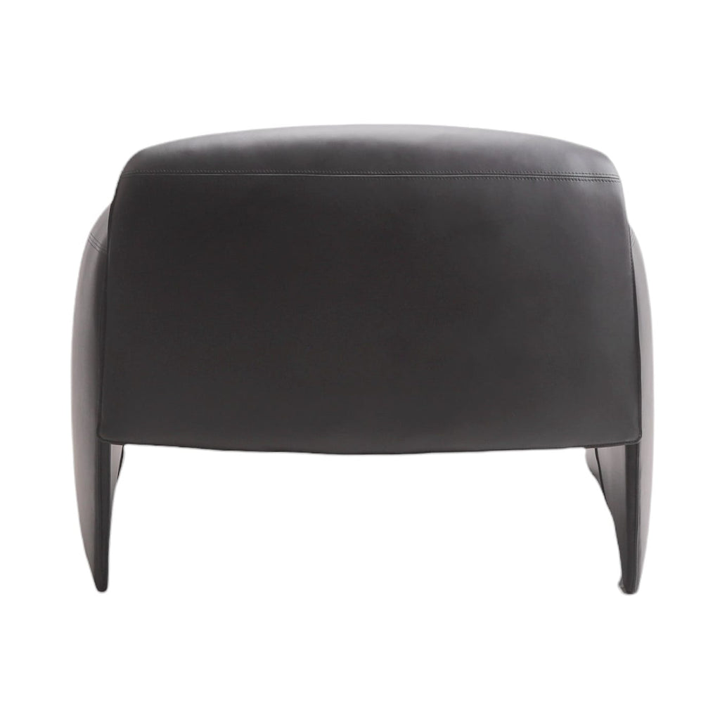 Le Club Armchair - defined arms in tailored upholstery