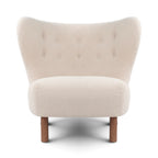 Front view of the Little Petra Lounge chair in a off-white Sherpa fabric with walnut legs | Nue Modern