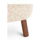 Detail view of the Little Petra Ottoman with Walnut Legs | Nue Modern
