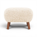 Little Petra Ottoman in a cream Sherpa with walnut legs | Nue Modern