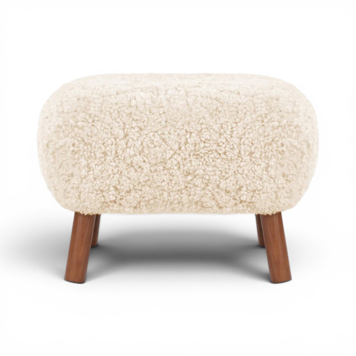 Little Petra Ottoman in a cream Sherpa with walnut legs | Nue Modern
