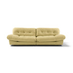 Milano two-seater sofa upholstered in light beige leather with tufted back cushions and rounded arms | Nue Modern