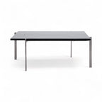 Front view of the PK61 Coffee Table with black marble top and stainless steel base | Nue Modern 