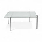 PK61 Coffee Table with glass top viewed from the side | Nue Modern