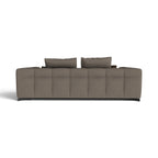 A modern upholstered sofa shown from the back, featuring a tufted backrest, two matching back cushions, and dark legs, in a solid taupe-brown fabric against a plain white background.