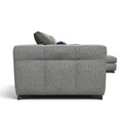 A modern gray textured fabric sectional sofa shown from a side angle against a plain white background.