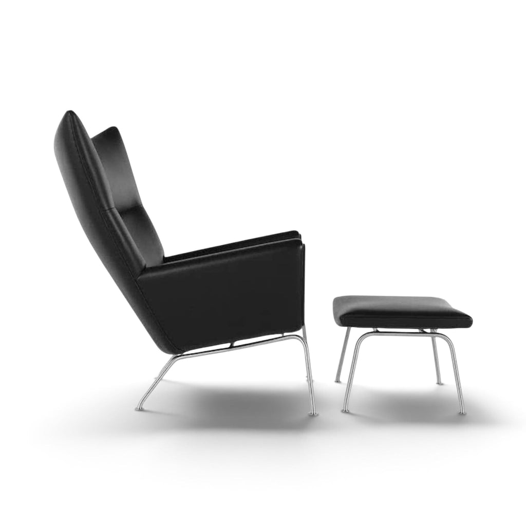 CH445 Wing Chair in leather - side view of the wings