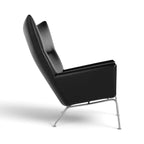 CH445 Wing Chair in leather - profile view