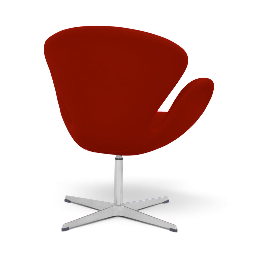 Swan Chair with a deep red upholstered shell and a chrome four-star base | Nue Modern