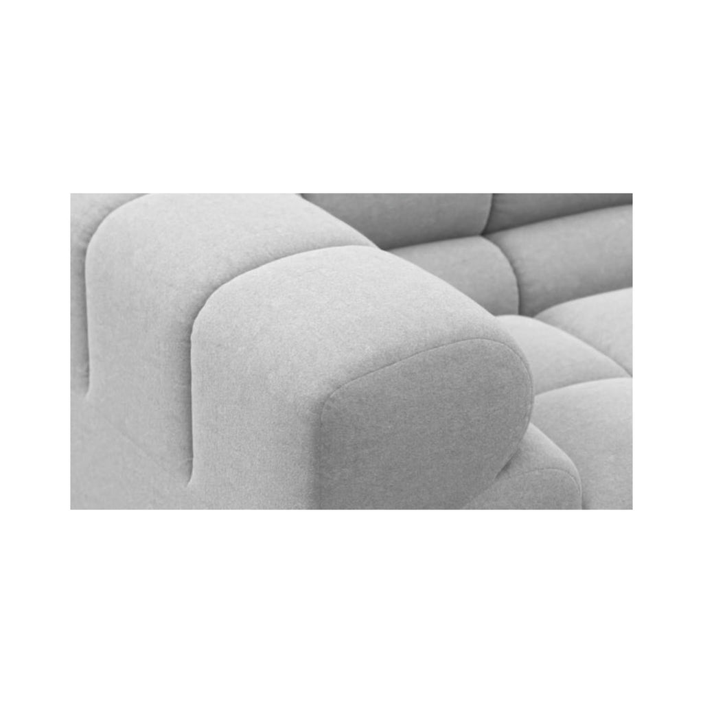 Grey Tufty-TF005 close up of armrest on a white background.