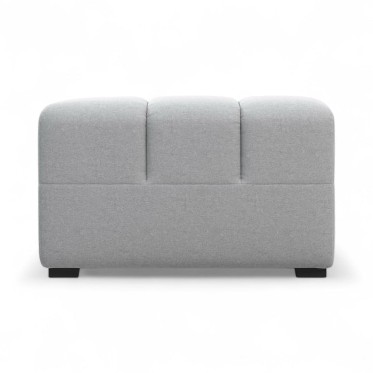A modern light grey upholstered Tufty-TF005, viewed from the side, with dark square feet, set against a white background