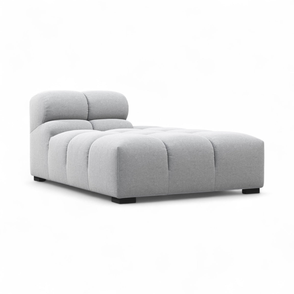 Grey upholstered Tufty TF018 in a three-quarter view on a white background