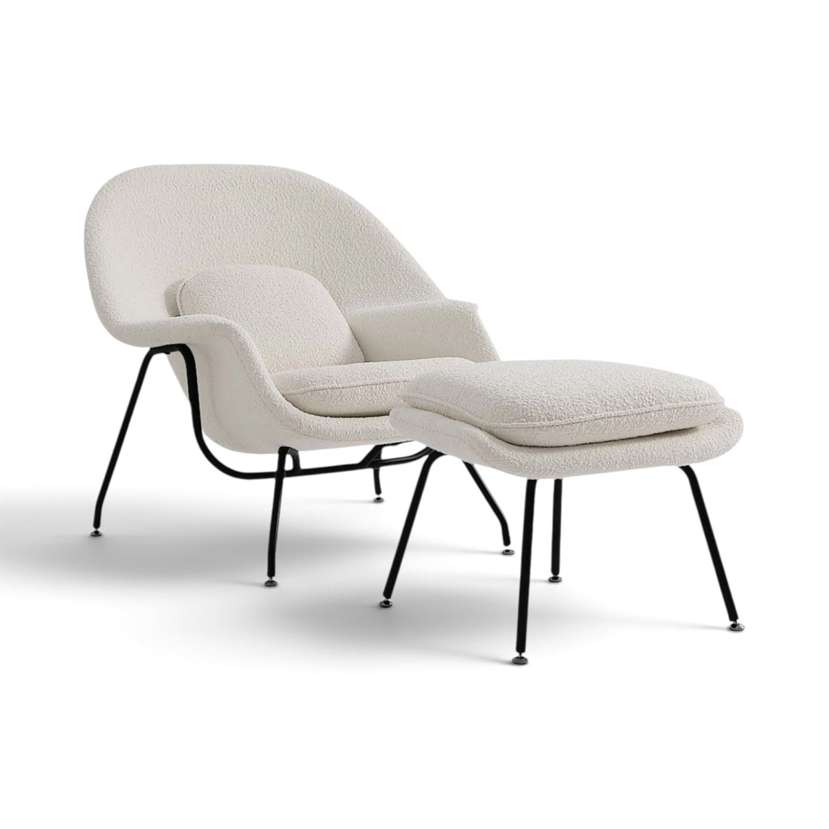 Womb Chair and Ottoman in bouclé - angle view