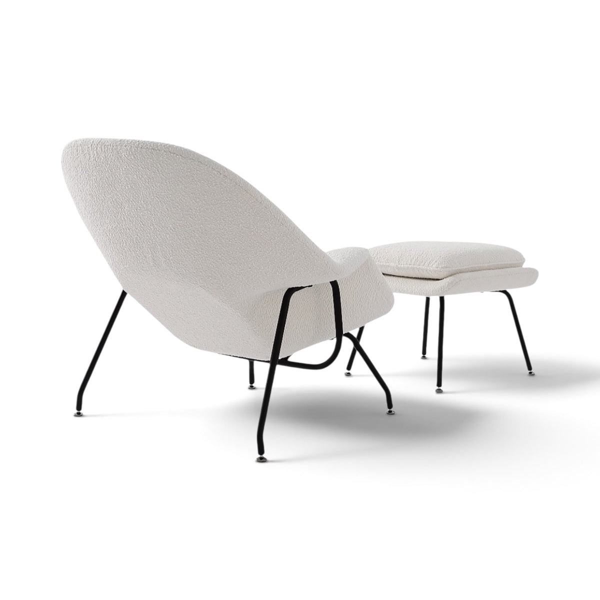Womb Chair and Ottoman in bouclé - back angle view
