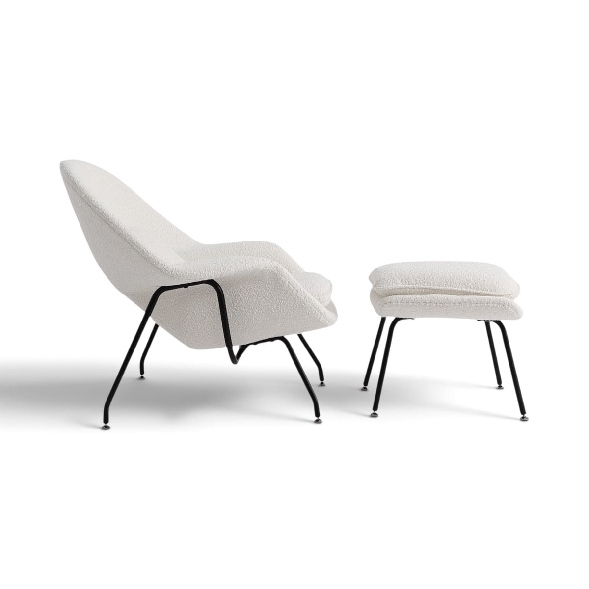 Womb Chair and Ottoman in bouclé - side view